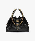 Chanel Quilted 25 Handbag Medium in Black - image 1 | MOAH