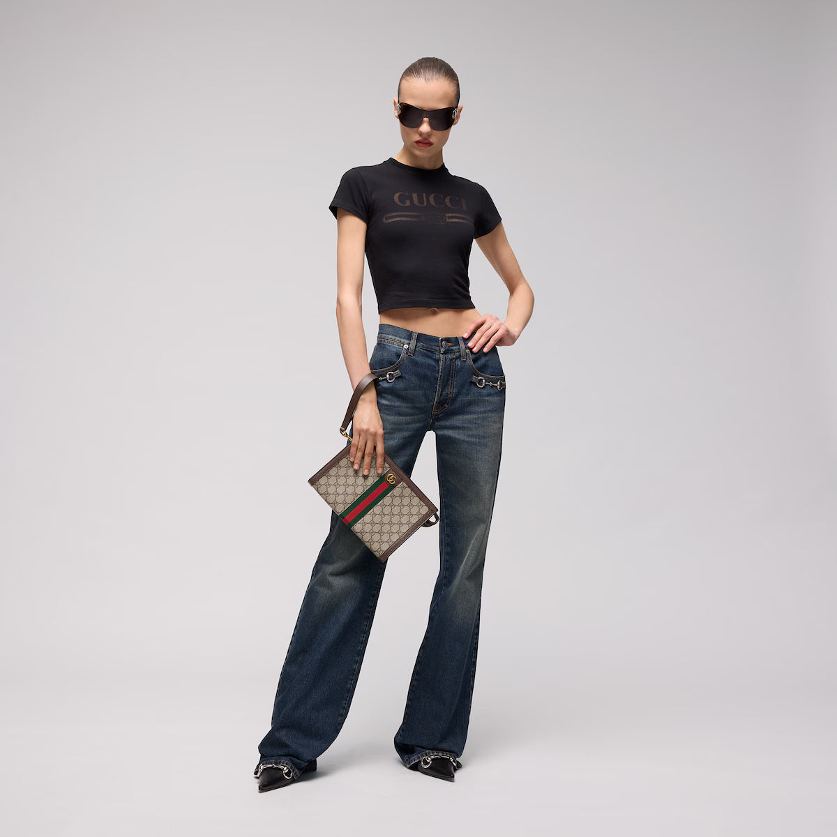 Gucci Ophidia Medium Pouch in beige and ebony GG Supreme canvas with Double G hardware - angled view | MOAH