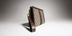 Gucci Ophidia Medium Pouch in GG Supreme canvas with brown trim and green and red Web stripe - lifestyle view | MOAH