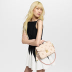 Louis Vuitton Pochette Métis Monogram Empreinte Eden M14977 worn view