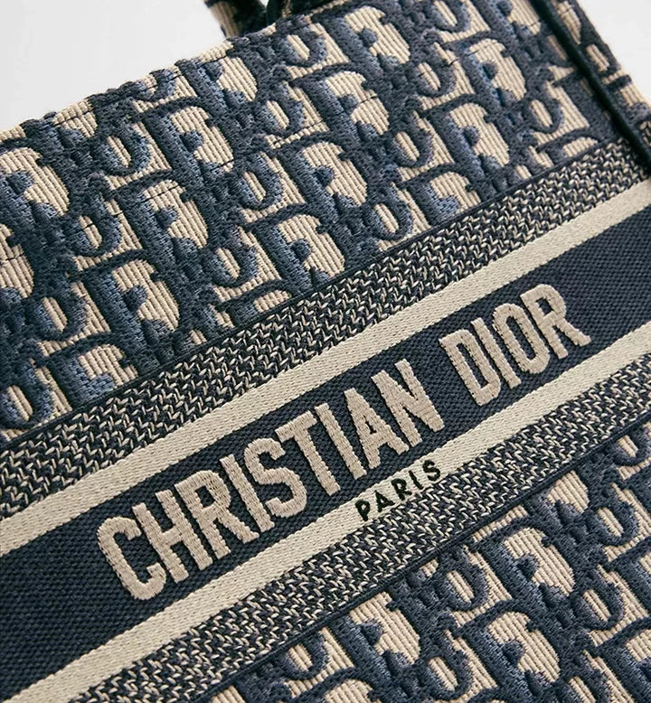 MOAH Christian Dior small book tote in navy and beige embroidered textile with iconic Oblique motif and signature logo