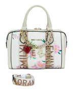 MOAH Emily Loran floral satchel with monogram print, heart and butterfly charms, and detachable logo shoulder strap.