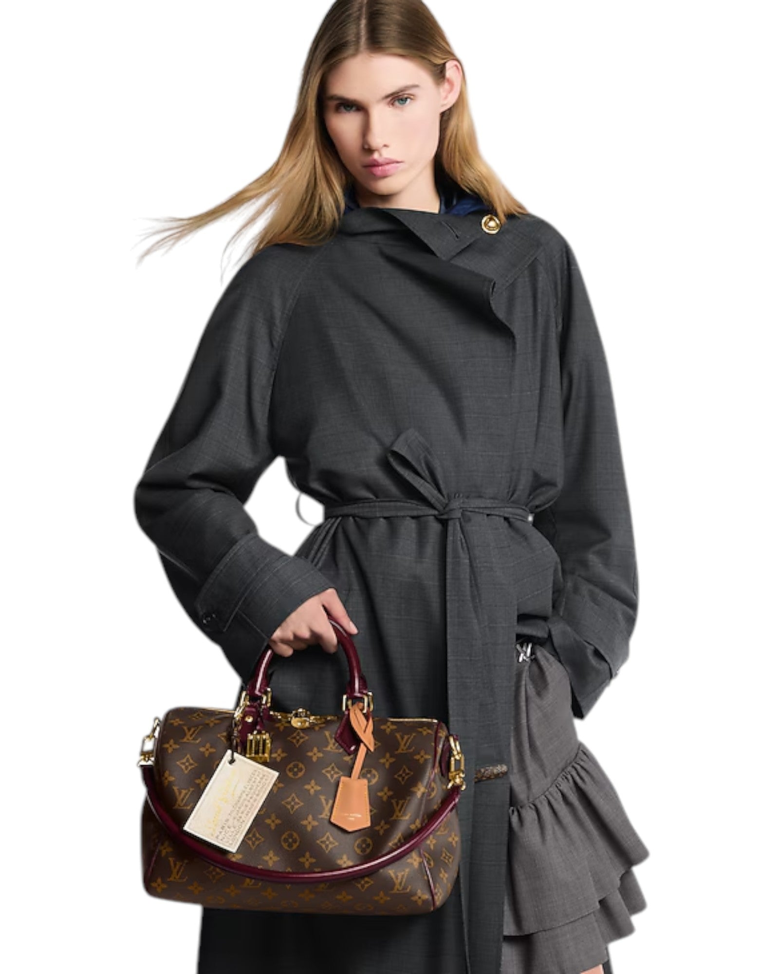 MOAH model carrying a Louis Vuitton Monogram canvas handbag with burgundy leather trim and gold-tone hardware.