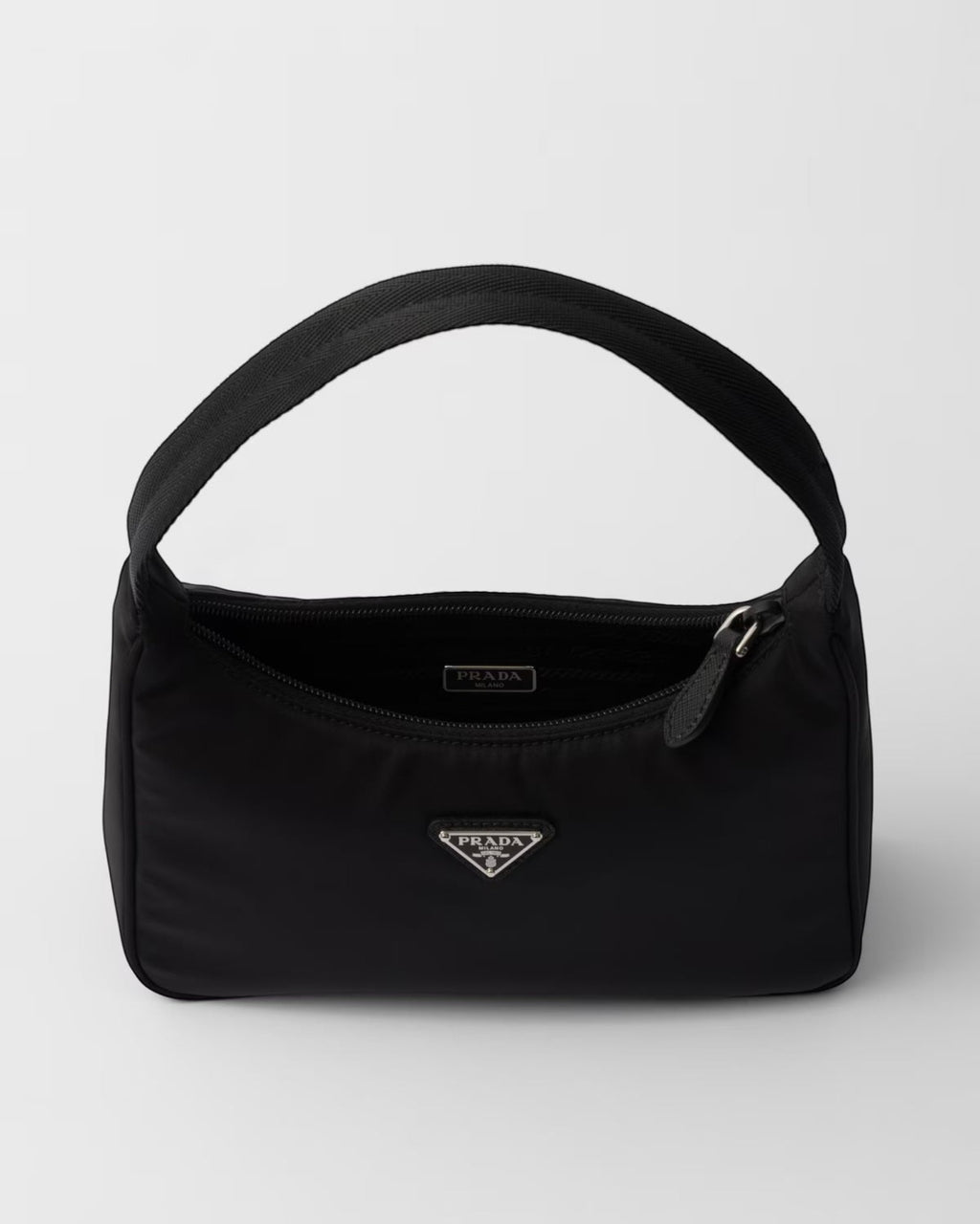 MOAH Prada Re-Edition 2000 mini bag in black recycled Re-Nylon with a woven handle and enameled metal triangle logo.