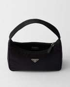 MOAH Prada Re-Edition 2000 mini bag in black recycled Re-Nylon with a woven handle and enameled metal triangle logo.