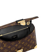 Louis Vuitton Trunkie monogram canvas shoulder bag interior pocket detail view.