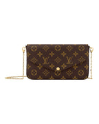MOAH shoes Louis Vuitton envelope chain wallet in iconic monogram canvas with gold hardware and detachable chain strap.