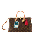 MOAH shoes Louis Vuitton Speedy Bandouliere handbag in brown Monogram canvas with leather trim and travel luggage tag