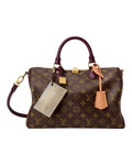 MOAH shoes Louis Vuitton Speedy handbag in Monogram canvas with burgundy leather trim and gold-tone hardware.
