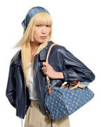 MOAH model wearing a blue denim Monogram Speedy Soft 30 bag with leather trim and matching headscarf